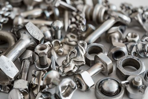 零散不锈钢螺丝钉五金工具摄影 打造专业广告素材的高效指南